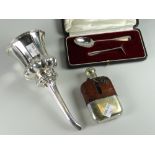 A hallmarked silver cased spoon & pusher set together with an EPNS plate wine funnel & strainer &