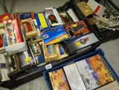 Parcel of vintage Triang with electric controls, two crates of various boxed diecast vehicles