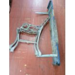 Pair of metal bench ends and a blue painted shelf with 'Austin Morris' car badge
