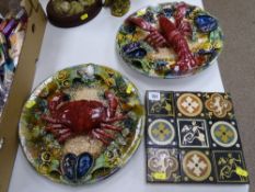 Pair of Portuguese crab and lobster mounted plaques in the Palissy style and a group of nine small