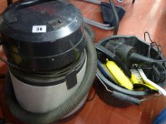 Hoover Aquamaster Wet 'n' Dry vac and a bucket and contents E/T