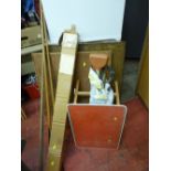 Two small folding tables, a parcel of snooker cues, bullworker and a boxed pruner etc