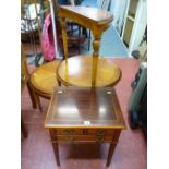 Circular occasional table with two half moon side tables and a mahogany inlaid occasional table with