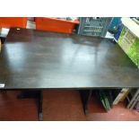 Dark wood refectory style table
