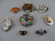 Collection of Scottish and other Cairngorm and hardstone set brooches and pendant necklaces