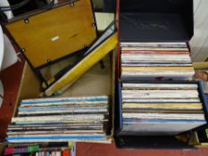 Collection of LP records etc in two carry cases with a further loose quantity, artists include