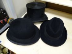 Vintage Exacta top hat along with a bowler hat and one other and three vintage brollies