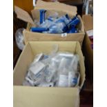 Box of 230mm/9ins Caulking guns and a box of electrical switches