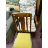 Wooden framed rocking chair and a polished wood hall chair