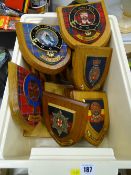 Quantity of heraldic wooden shield shaped plaques with various emblems for Scottish Clans and