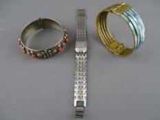 White metal lady's bangle and one other and a stainless steel Santima lady's wristwatch