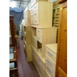 Large parcel of modern bedroom furniture including dressing tables, chests of drawers, single