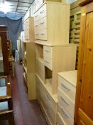 Large parcel of modern bedroom furniture including dressing tables, chests of drawers, single