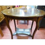 Oval two tier occasional table with inlaid central motif