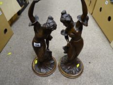 Pair of spelter figurines of young maidens with outstretched arm