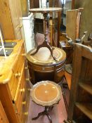 Revolving reproduction drum bookcase with leather top and a pair of non-matching wine tables