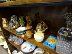 French glass decanter and stopper, a Belleek pottery jug and other decorative ornaments