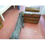 Vintage bag of golf clubs, a cased manual Singer sewing machine and four drawer wooden cabinet