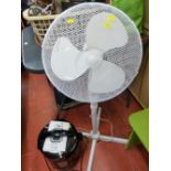 White floorstanding fan and a Pressure King Pro food cooker E/T