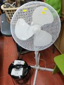 White floorstanding fan and a Pressure King Pro food cooker E/T
