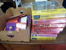 Parcel of seven jigsaws and a box of miscellaneous greeting cards