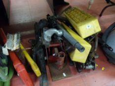Parcel of two trolley jacks, wheel chocks, various manual jacks and a tow bar with tow hitch etc