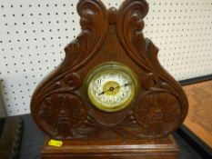 Carved and polished decorative mantel clock