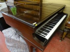 Well preserved mahogany encased Challen baby grand piano