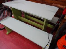 Painted wooden garden table and two bench seats