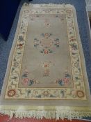 Oblong washed Chinese floral rug