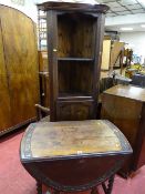 Oval oak gate leg tea table with barley twist supports and carved top border and a reproduction open