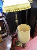 Brass standard lamp with tasselled shade and a brass table lamp with shade E/T