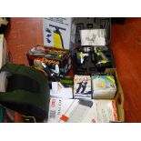 Boxed Piston air pump, a Challenge Extreme cordless hammer drill, a rubber made cooler carrier,