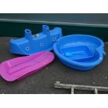 Parcel of children's play items including plastic see-saw, sledge and sandpit etc