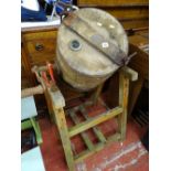 Wooden barrel butter churn on stand