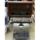 Vintage Lexikon 80 typewriter by Olivetti and a vintage Murphy radio