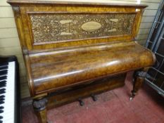 Finely encased walnut upright piano by John Broadwood & Sons with fine fretwork front panel,