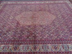 Good all wool red patterned small carpet, approx 3.5 x 2.5 metres