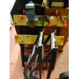 Black & Decker workmate with fitted blue vice and a pair of metal car ramps