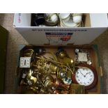 Two boxes of brass fire irons, copperware, wall clock, white metalware and a parcel of miscellaneous