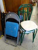 A parcel of folding chairs & a set of restaurant chairs