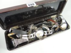 A lacquered box containing a quantity of gents wristwatches