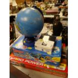 A Micro Scalextric boxed racing car set, a boxed Thunderbird 2 electronic playset, globe lamp etc