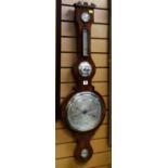 An antique aneroid banjo barometer with silvered dials by J Sonoguini