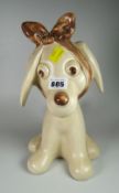 A Sylvac dog with bandaged ear