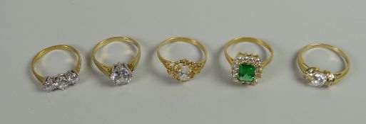 Five yellow metal multi-coloured stone dress rings, some marked 14k