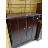 A Stag Minstrel entertainment cabinet with concertina doors