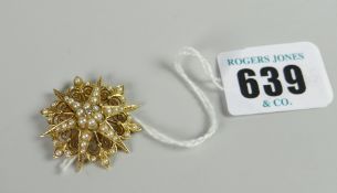 An 18ct gold pearl & diamond target brooch (diamonds estimated at 0.02ct)
