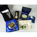 Two modern wristwatches, novelty paperweight etc