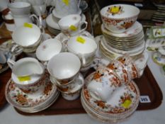 A tray of various patterned Staffordshire teaware